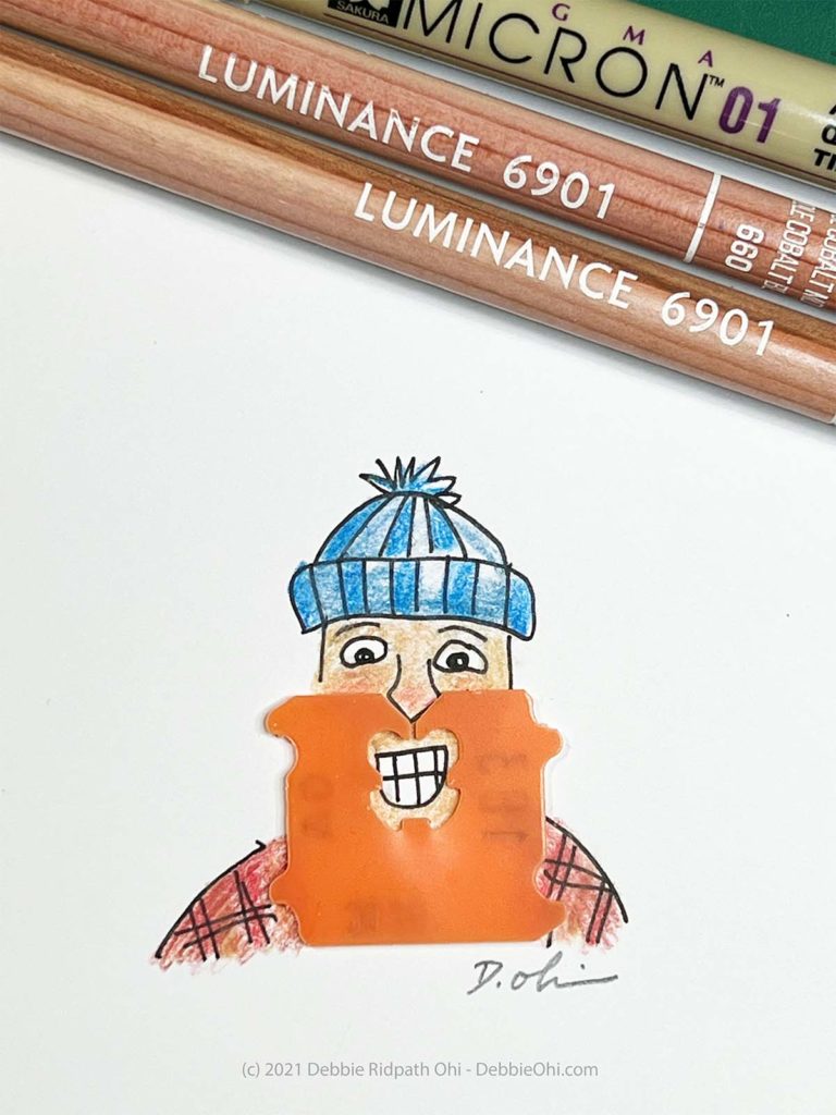 Drawing of man with orange beard that is actually a bread tag.